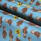 Universal Studios™ Curious George Cotton Fabric